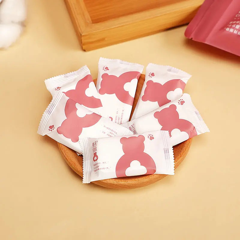 20-pcs portable compressed facial towels with custom Spring Bear packaging, produced by Little Cotton contract manufacturer.