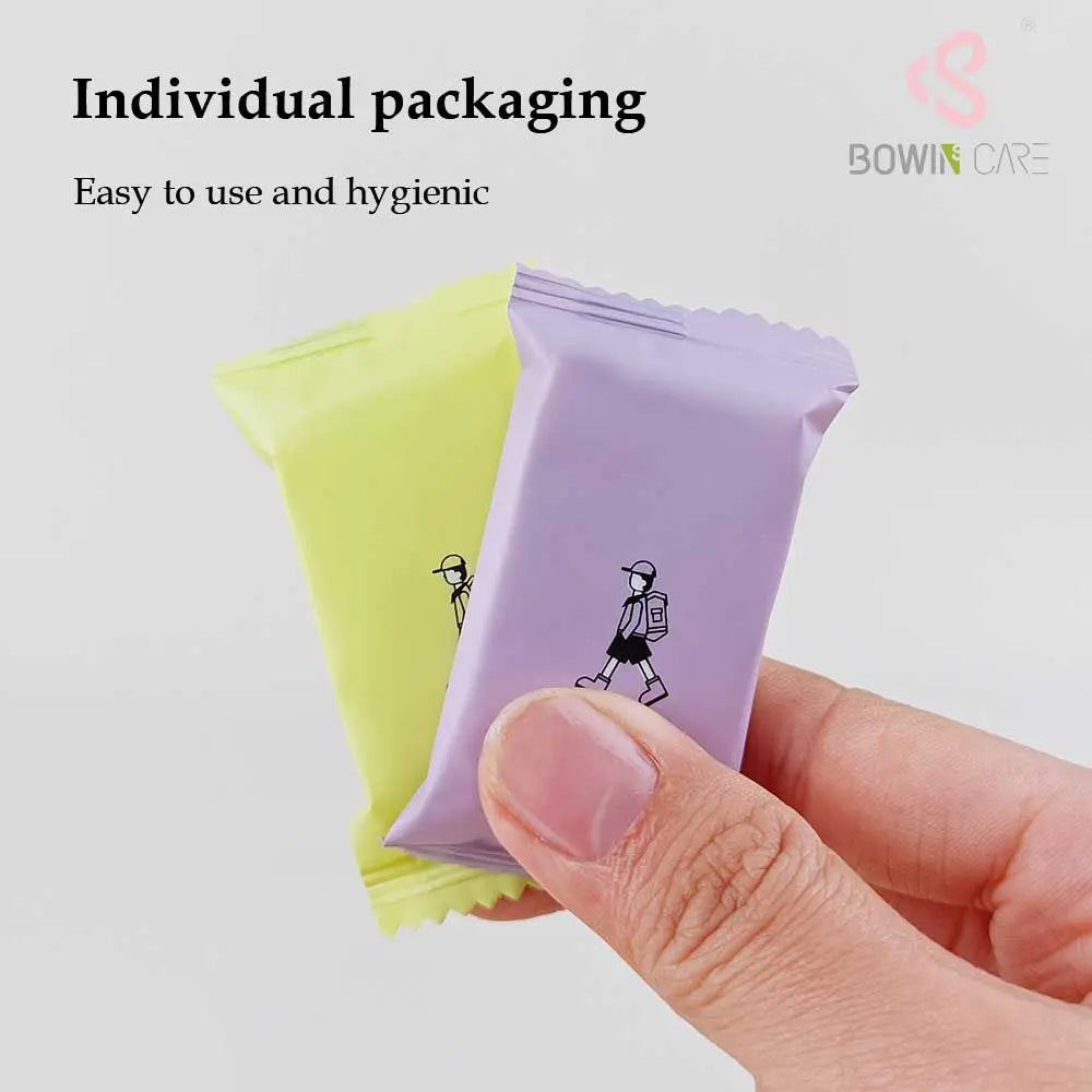 14-pcs 7-color travel disposable magic compressed coin towels, manufactured by Little Cotton OEM factory.