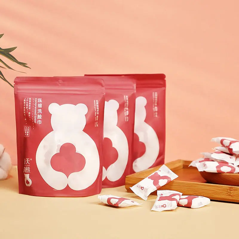 20-pcs portable compressed facial towels with custom Spring Bear packaging, produced by Little Cotton contract manufacturer.