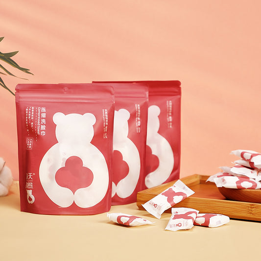 20-pcs portable compressed facial towels with custom Spring Bear packaging, produced by Little Cotton contract manufacturer.