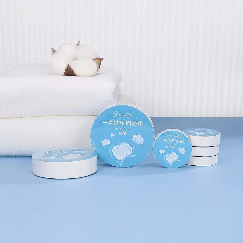 Premium disposable compressed face and bath towels for travel and hotel amenities, manufactured by Little Cotton OEM factory.