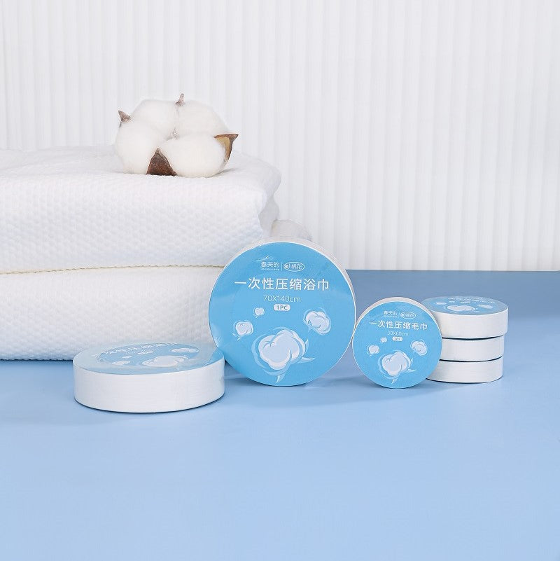 Premium disposable compressed face and bath towels for travel and hotel amenities, manufactured by Little Cotton OEM factory.