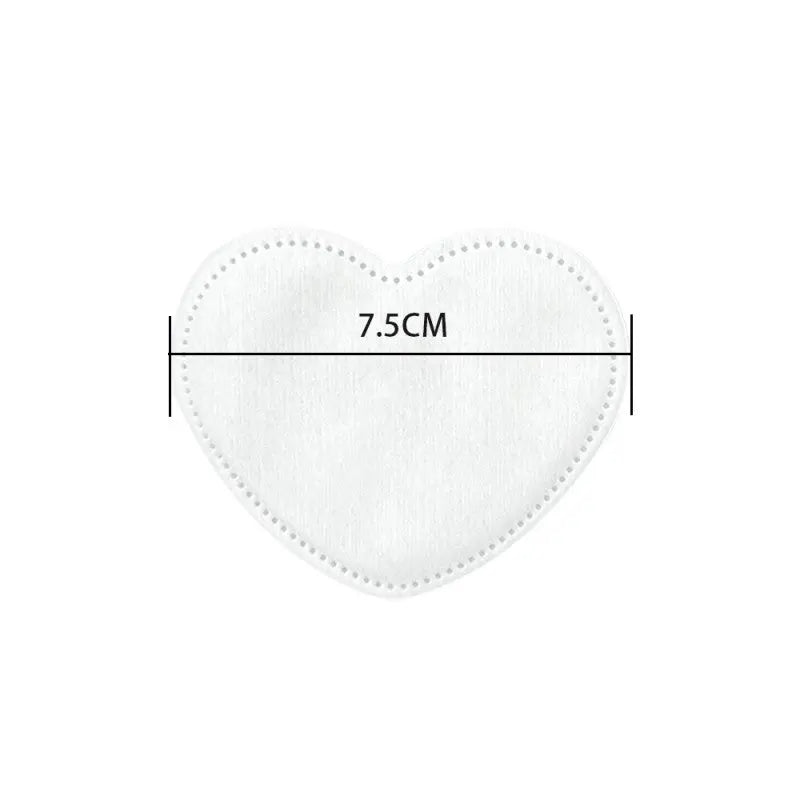 Bespoke heart-shaped organic cotton pads for beauty gift sets, manufactured by Little Cotton's precision OEM facility.