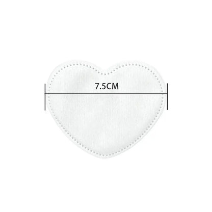 Bespoke heart-shaped organic cotton pads for beauty gift sets, manufactured by Little Cotton's precision OEM facility.