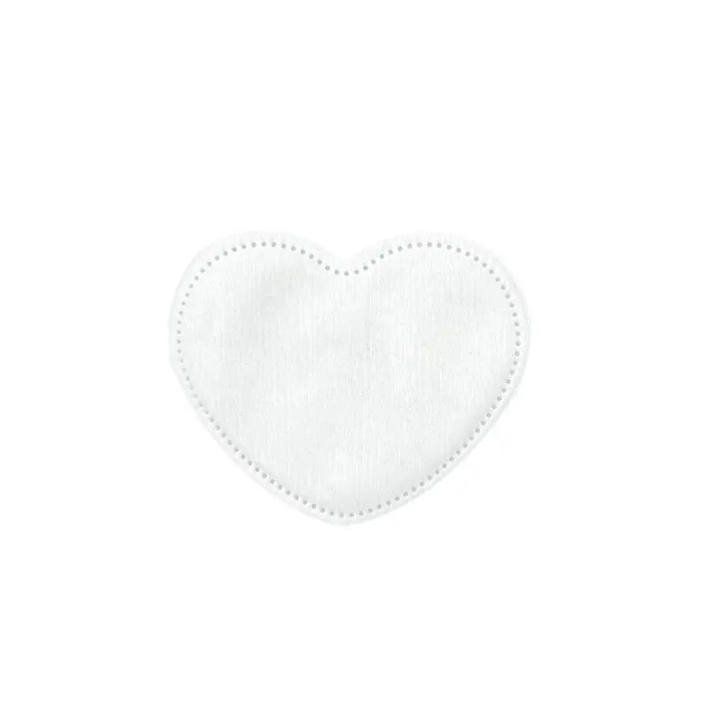 Bespoke heart-shaped organic cotton pads for beauty gift sets, manufactured by Little Cotton's precision OEM facility.