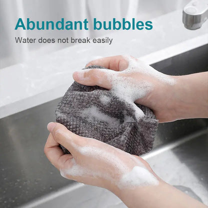 Highly absorbent oil resistant nonwoven cleaning wipes for commercial kitchens