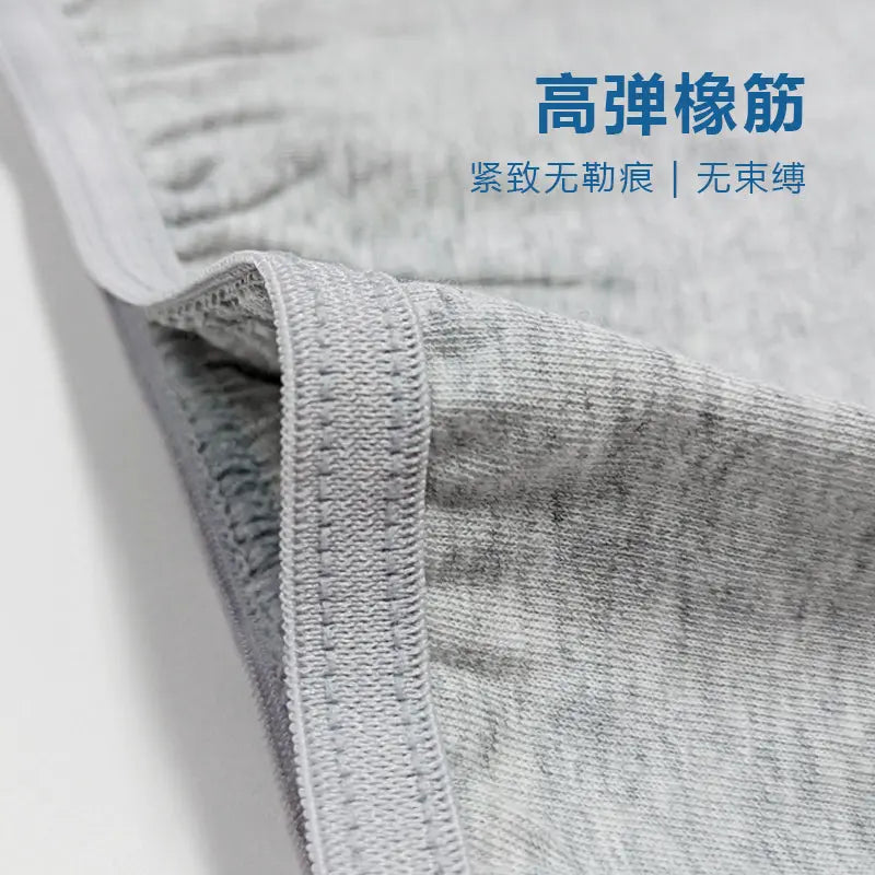 Premium men's disposable boxer briefs in plus size, retail 5-pack for travel and spa, mass-produced by Little Cotton OEM facility.