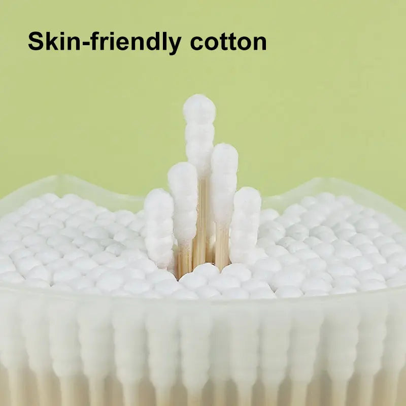 Close-up of precision cat ear shape pure cotton buds for makeup touch-ups