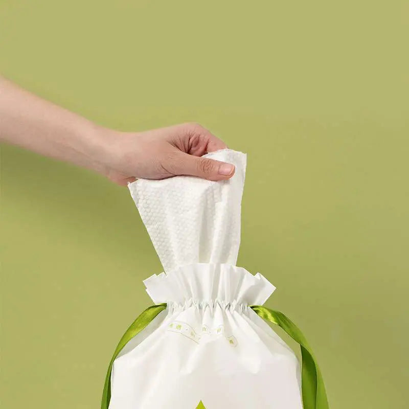 Wholesale 80GSM ultra-thick cotton cleansing towel roll 60pcs OEM manufacturer