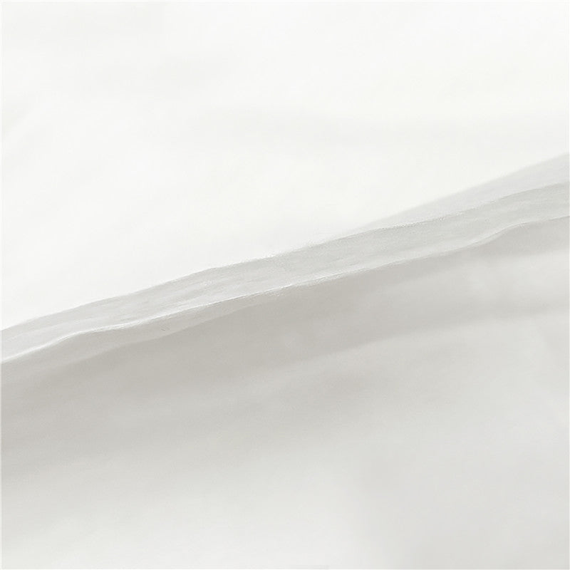 Close-up of premium tri-layer spunlace nonwoven material for wet wipes converting